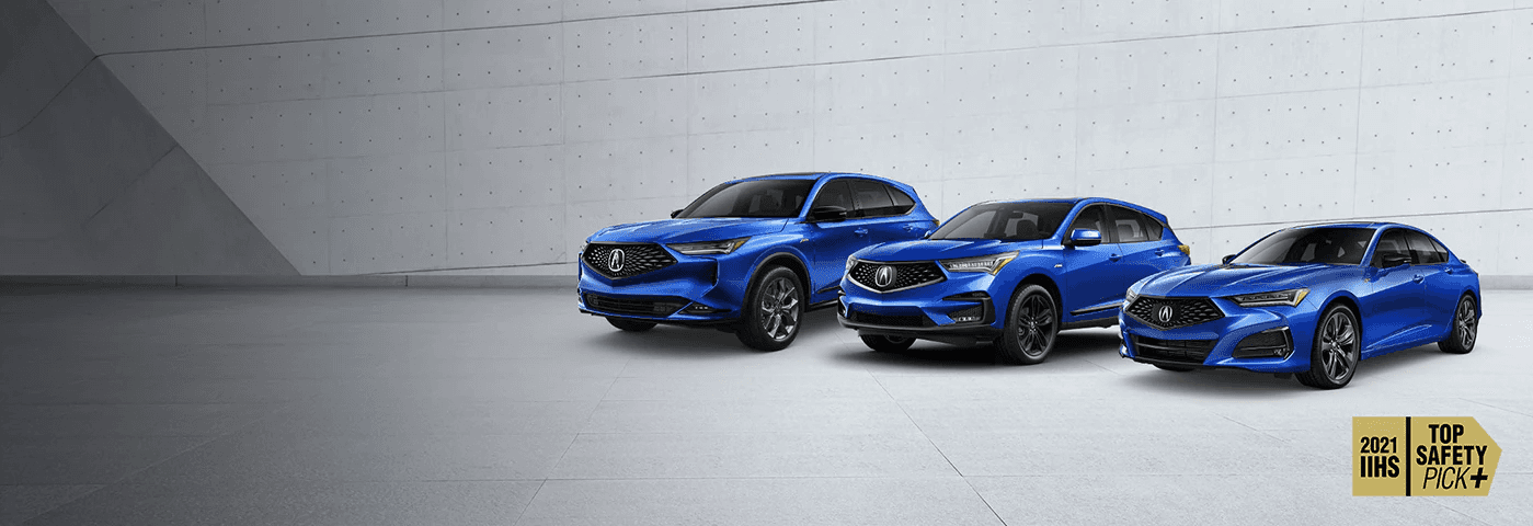 three blue 2022 Acura models lined up next to each other amongst grey background