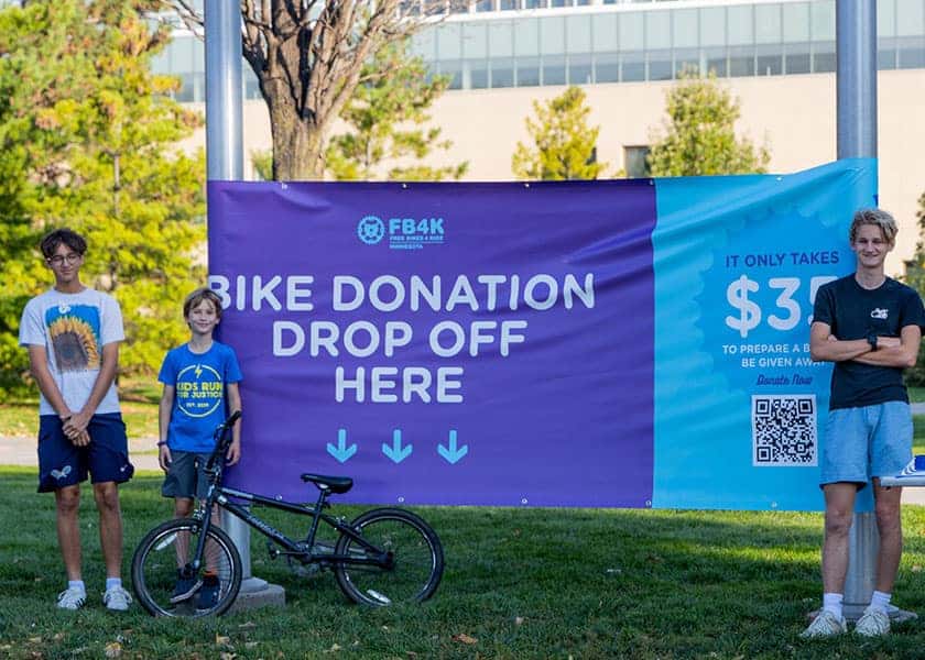 Bike donation event with Apple Autos team
