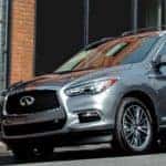 2020 INFINITI QX60 parked in front of music store