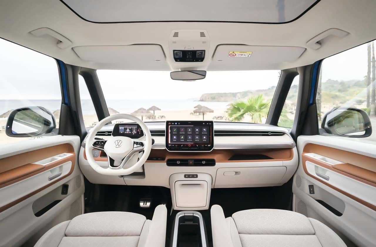 2025-Volkswagen-ID-Buzz-interior-view-of-the-front-seats-dashboard-and-large-screen