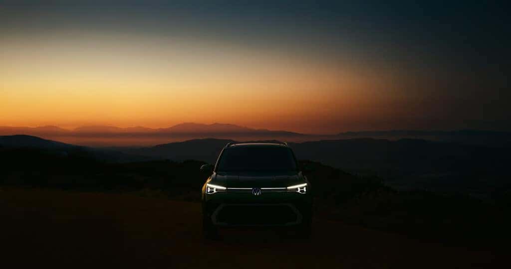 2025 Volkswagen Taos silhouette in the desert at dawn