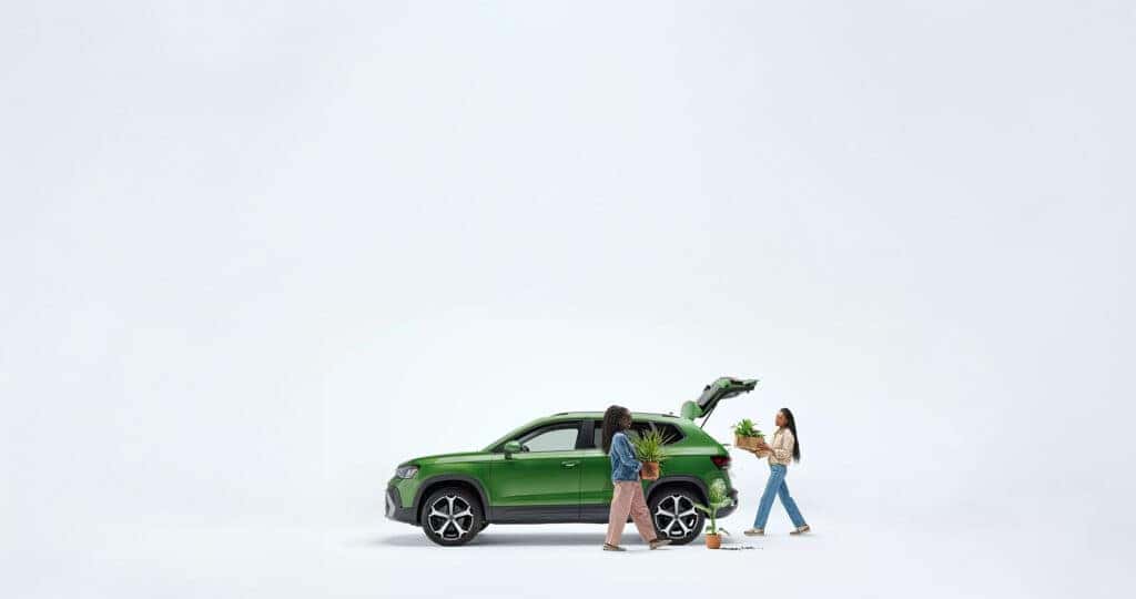 2025 VW Taos in green with two women loading plants in the back