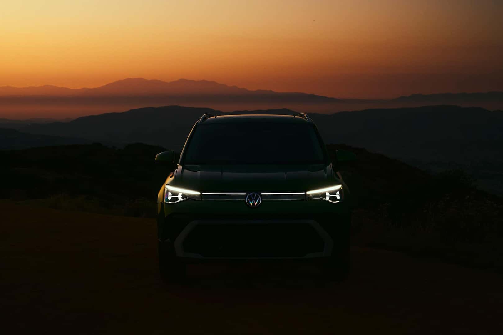 2025-Volkswagen-Taos-with-DRL-on-at-night-under-a-starry-sky
