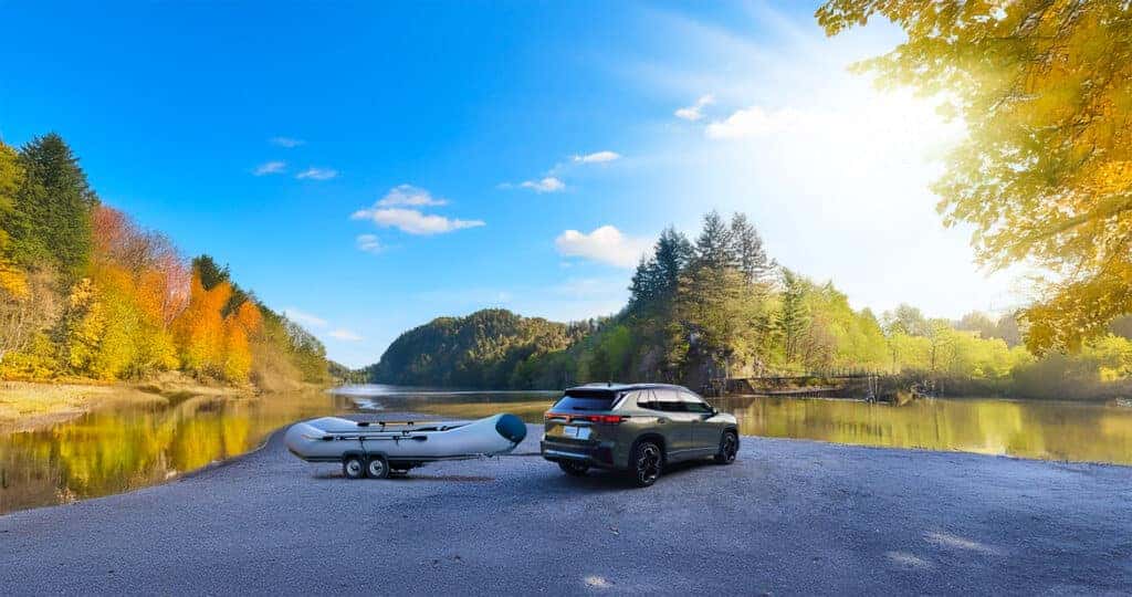 2025 Volkswagen Tiguan towing capacity being used to tow a trailer with a river raft