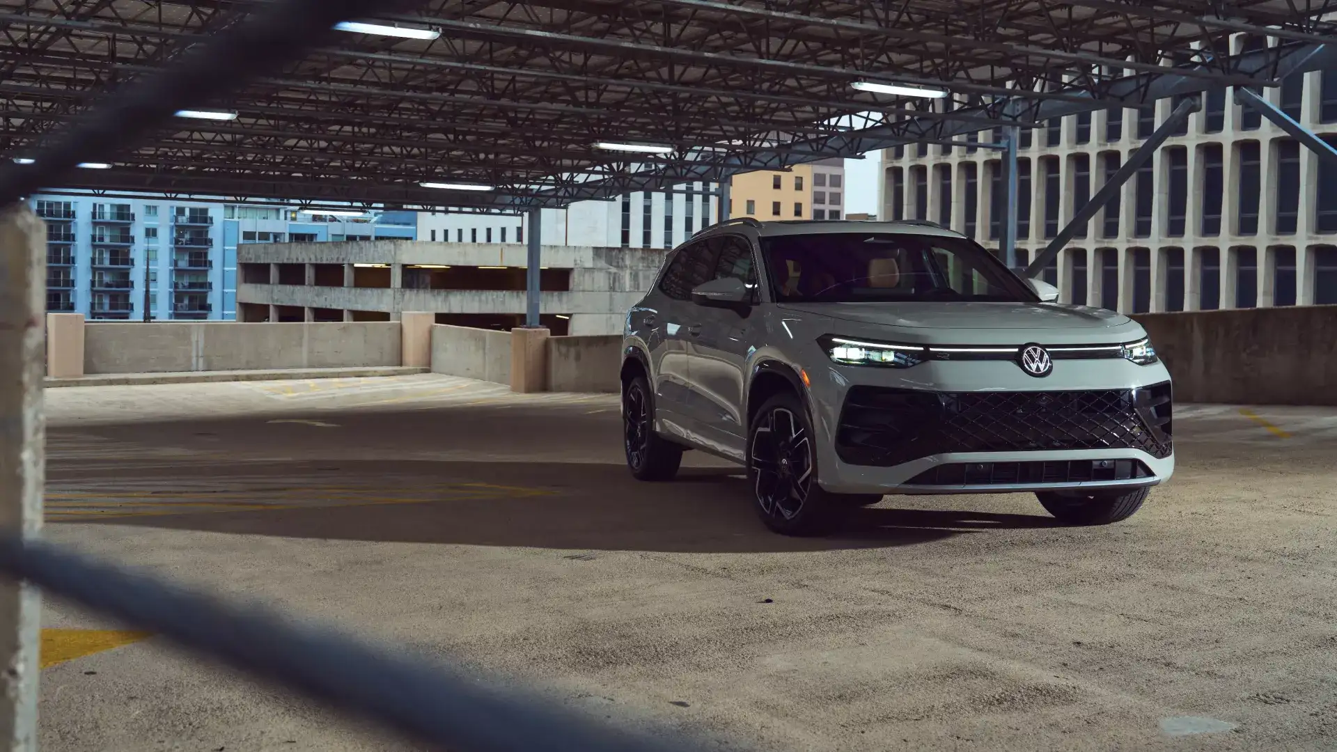2025 Tiguan parked under a construction garage