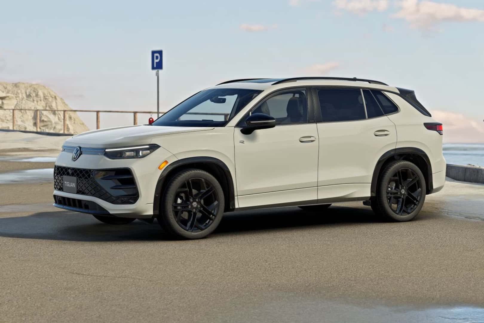 2026 Volkswagen Tiguan SE R-Line Black trim level parked on an oceanside cliff