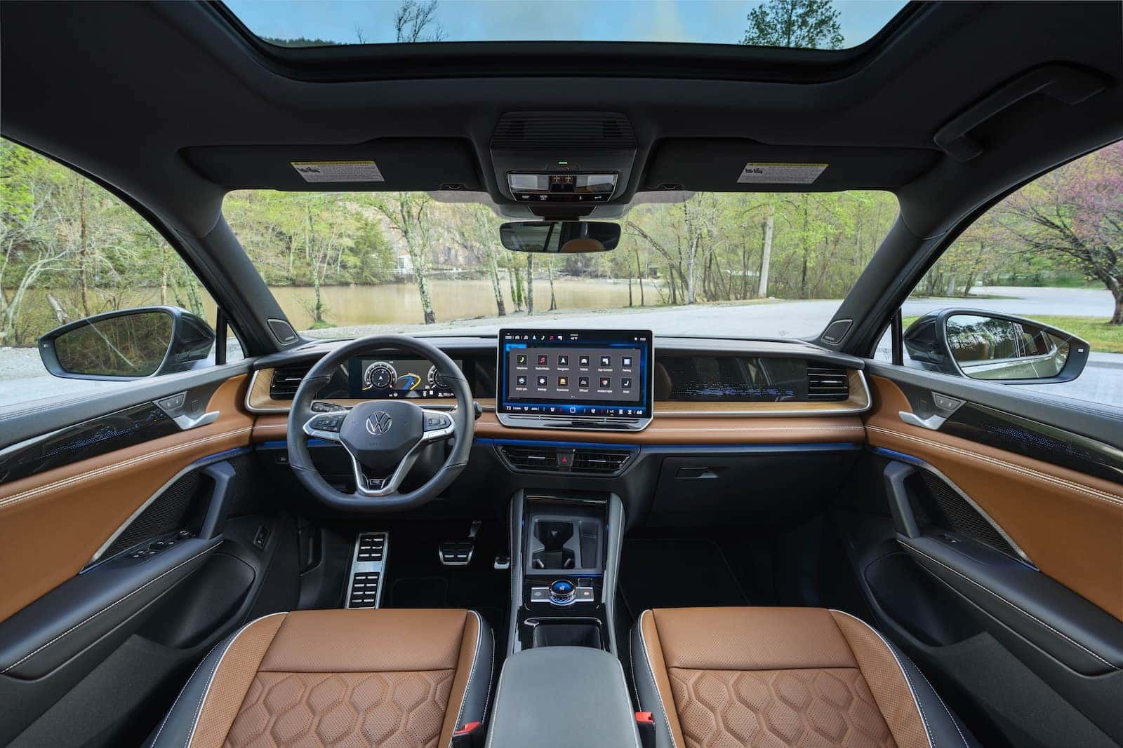 2026 Volkswagen Tiguan trim level interior showing front cabin in black and tan leather