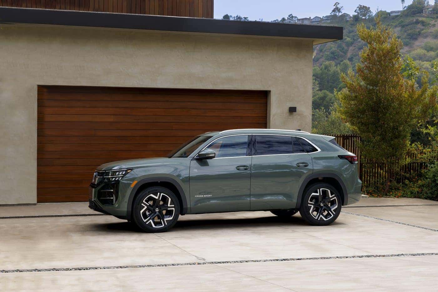 2027 Volkswagen Atlas Cross Sport side profile showing the lower coupe-like roofline