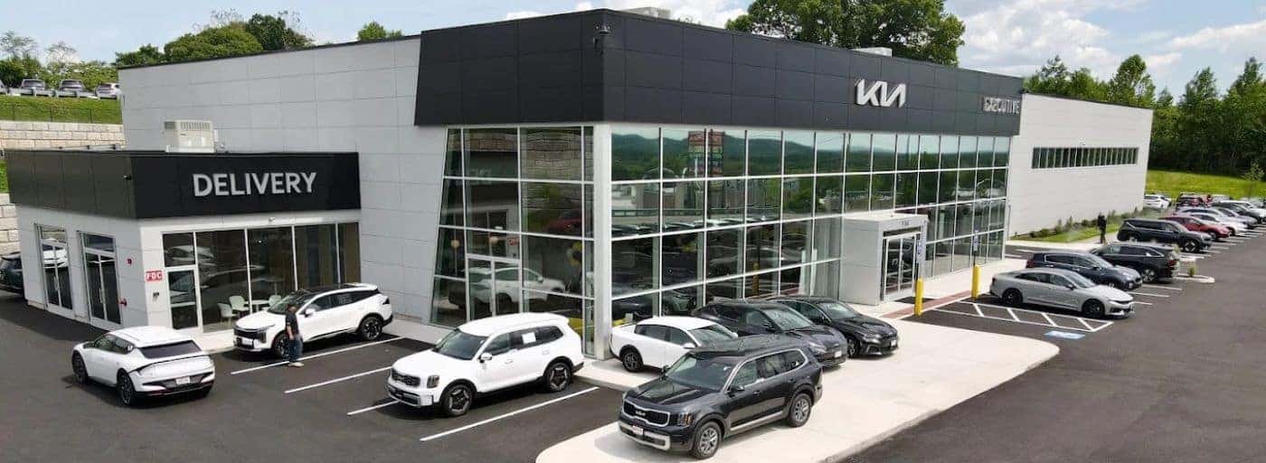 Executive Kia Storefront and cars in parking lot