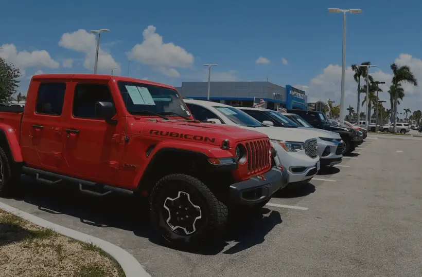 Used vehicle inventory in parking lot