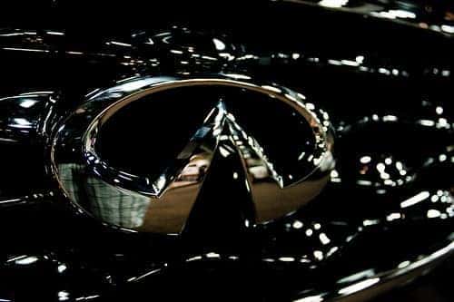INFINITI logo on a car at a dealership in Jackson, MS