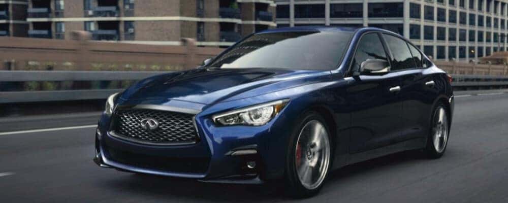 2021 INFINITI Q50 driving down road