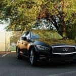 black INFINITI parked on the road in Jackson, MI
