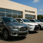 Large lineup of preowned vehicles on display at Herrin-Gear INFINITI dealership in Jackson Mississippi