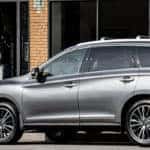 2020 INFINITI QX60 parked in front of music store