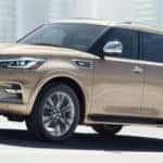 2019 INFINITI QX80 driving down freeway
