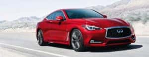 Red 2019 INFINITI Q60 traveling through desert