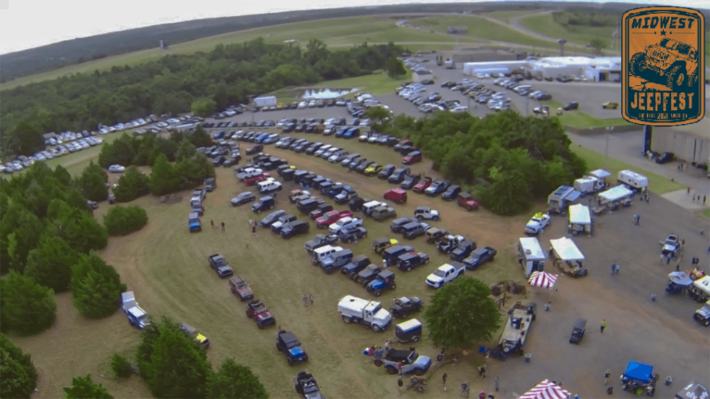 a large amount of jeeps parked together in a field in Guthrie, Oklahoma