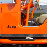 A Jeep Wrangler with a rubber duck on the running board in Guthrie Oklahoma at Midwest Jeepfest.