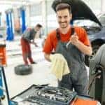 Car mechanic fixing a car