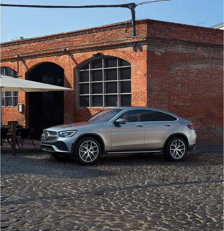 Mercedes-Benz crossover in front of a brick building