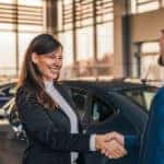 Customer and Car Dealer Shaking Hands