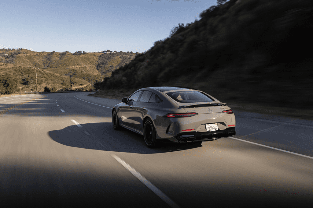 2025-Mercedes-AMG-GT-63-S-E-P-Driving-away-on-highway