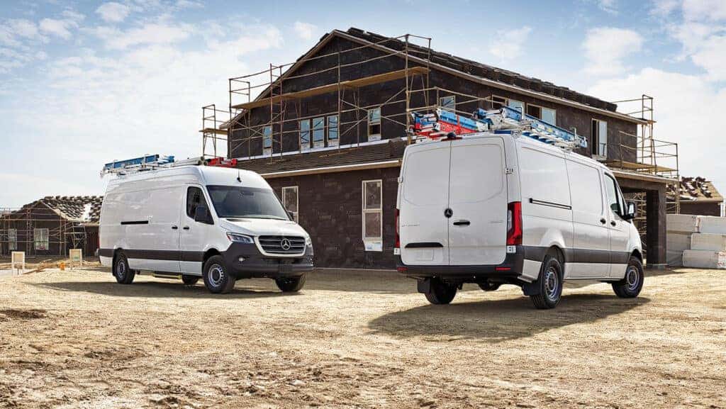 Two Mercedes-Benz Sprinter Vans at a job site