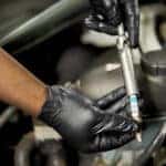 Technician installing Mercedes-Benz parts
