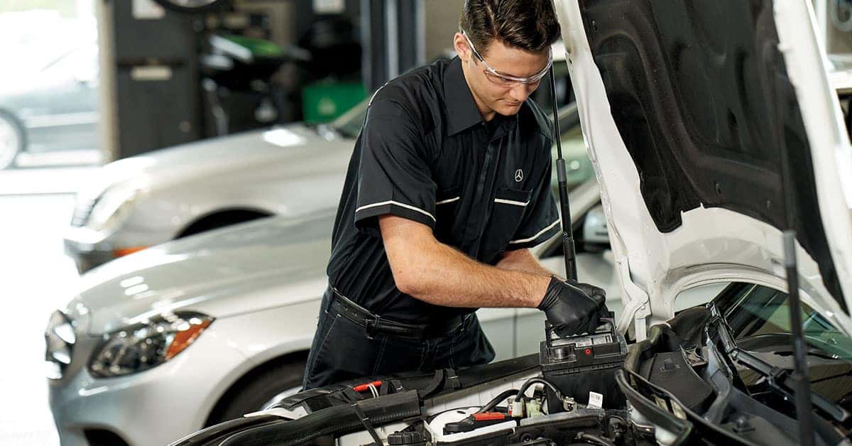 Technician working on Mercedes-Benz battery warranty service