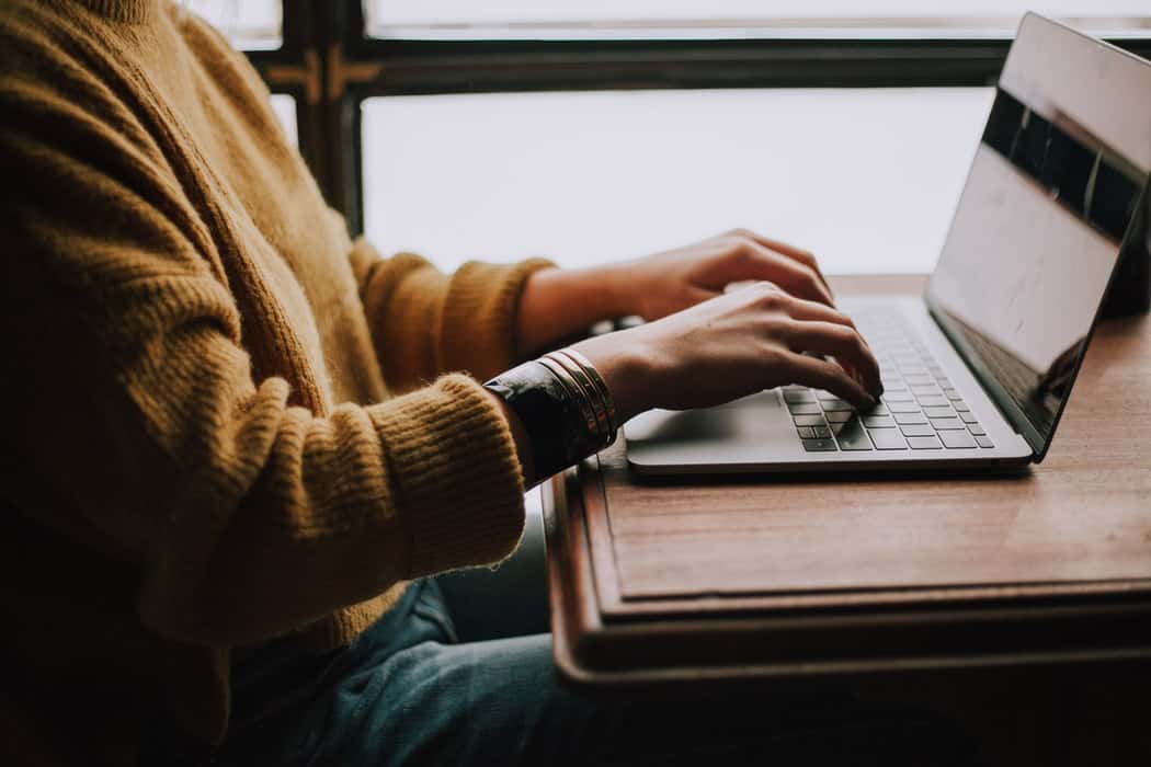 Person applying for Mercedes-Benz financing on a laptop