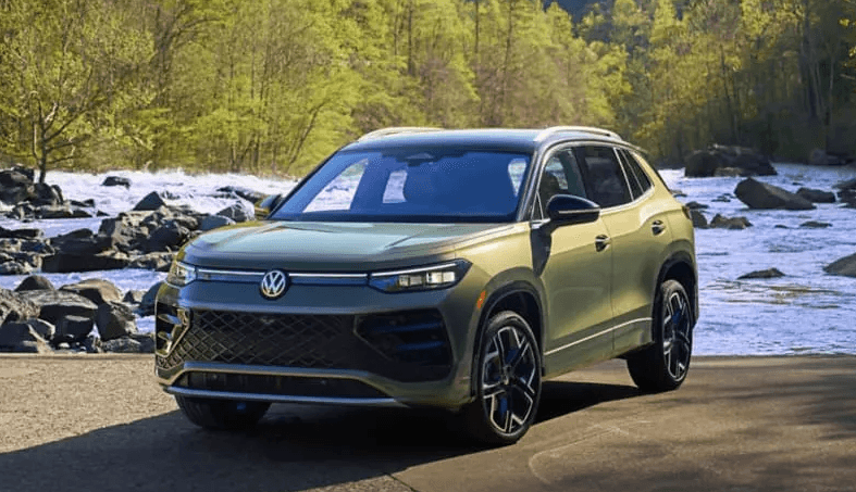 2026 Volkswagen Tiguan parked near scenic river road