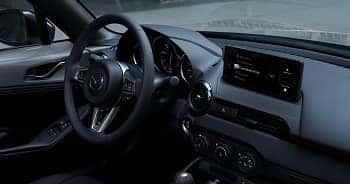 Every detail of the Mazda MX-5 Miata cabin, including its 8.8-inch display screen, can enhance
                        your driving experience.