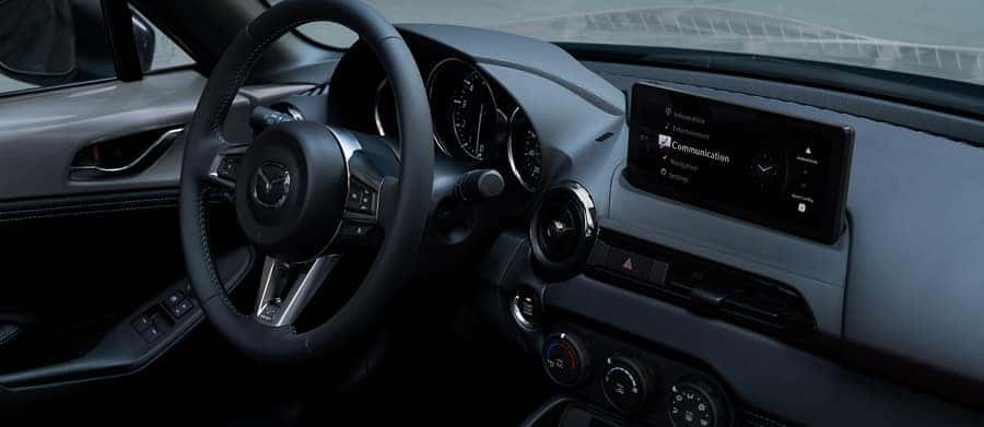Every detail of the Mazda MX-5 Miata cabin, including its 8.8-inch display screen, can enhance
                        your driving experience.