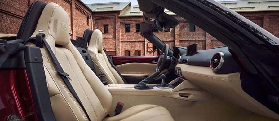 TAN NAPPA LEATHER SEATS WITH 35TH ANNIVERSARY EDITION LOGO ON HEAD REST
