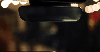 The available frameless rearview mirror automatically adjusts to reduce glare from headlights behind you.