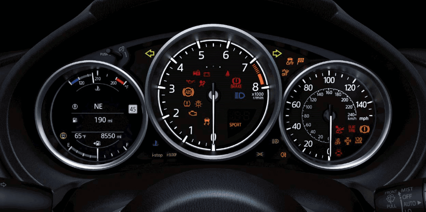 Different Mazda warning lights on the instrument cluster panel