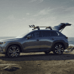 A 2026 Mazda CX-50 parked near a beach.