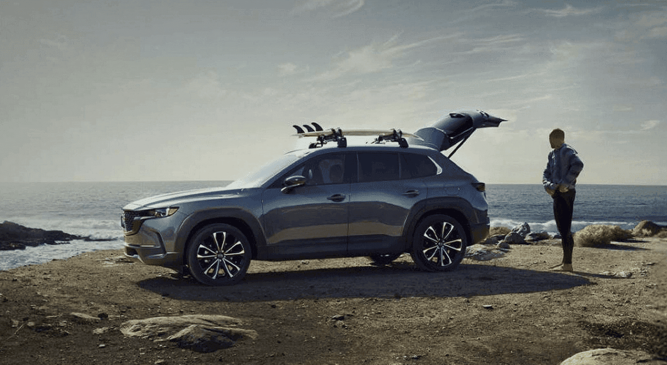 A 2026 Mazda CX-50 parked near a beach.