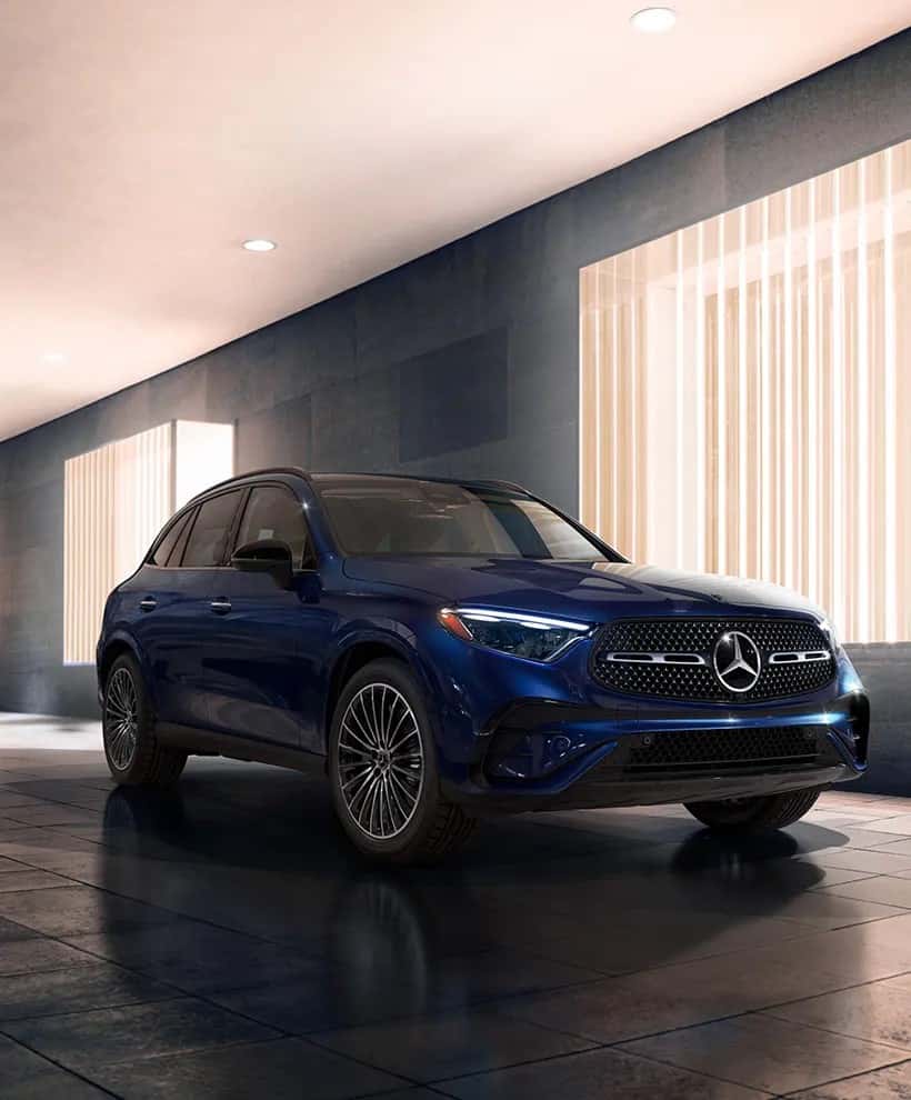 Blue 2026 Mercedes-Benz GLC parked in a showroom