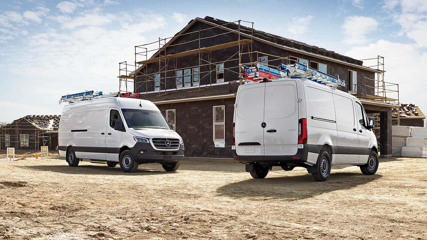 Two Mercedes-Benz Sprinters at a house construction site