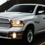 2015 ram 1500 laramie crew cab 4x4 ecodiesel front three quarter in motion