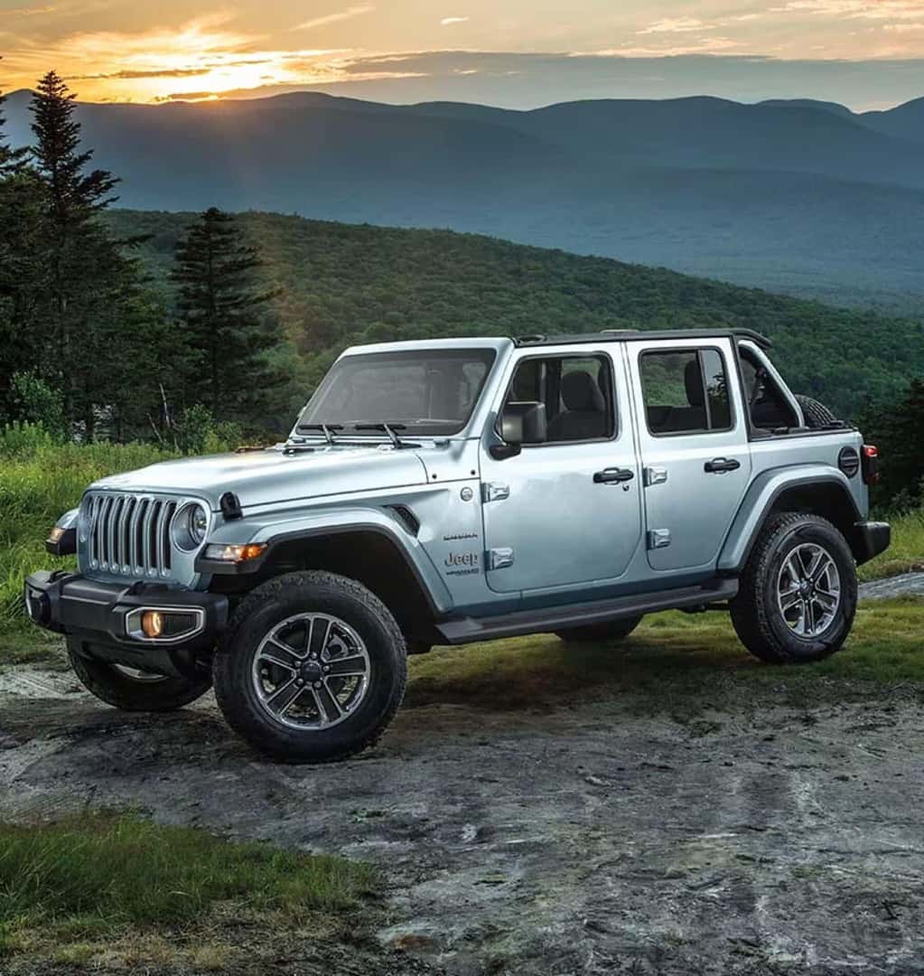 Silver Jeep Wrangler SUV Green Mountains