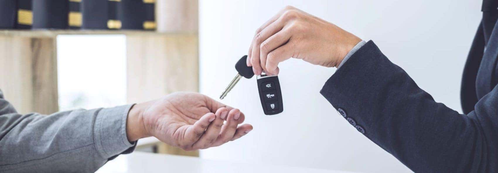 Handing over the keys to a new car