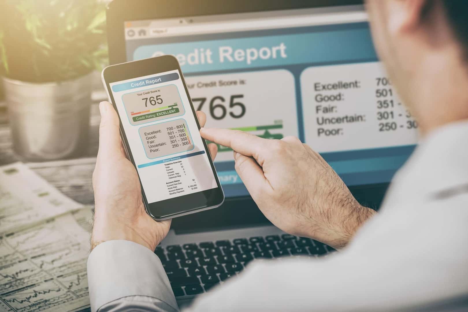 Man checking credit score on cellphone