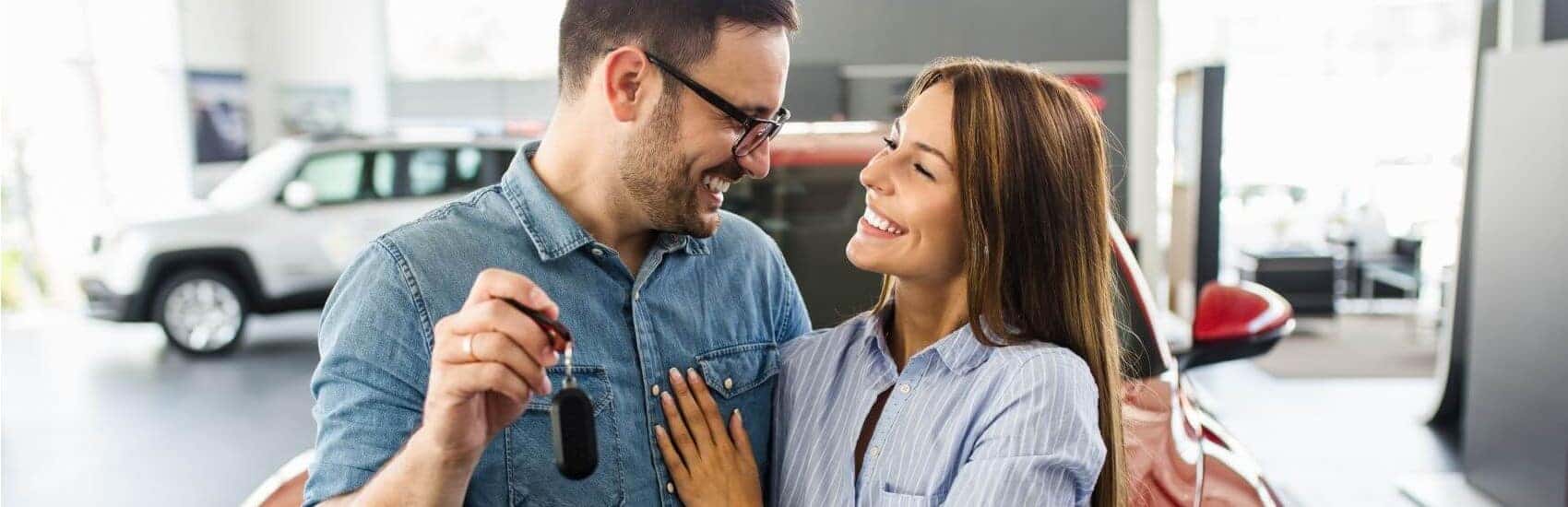 Couple with Their New Keys Snipped