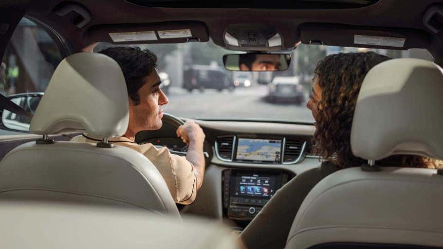 couple sitting in the new 2024 INFINITI qx50