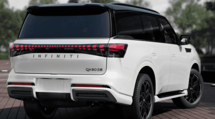 Rear three-quarter view of a white 2026 INFINITI QX80 SUV showing signature digital piano key LED taillights and rear badging available at Ramsey INFINITI near Route 17 in Bergen County NJ