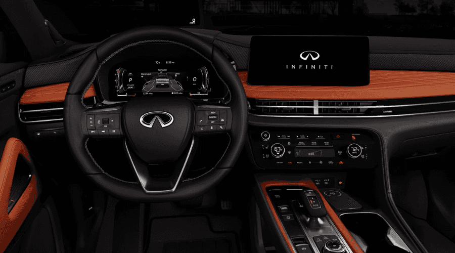 Interior cockpit of a 2026 INFINITI QX65 showcasing the digital instrument cluster displaying ProPILOT Assist 2.1 driver assist settings, leather steering wheel with driver assistance buttons, and central INFINITI InTouch display screen at Ramsey INFINITI in Bergen County, NJ
