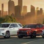 Chevrolet Lineup Against a City Skyline at Sunset_mobile